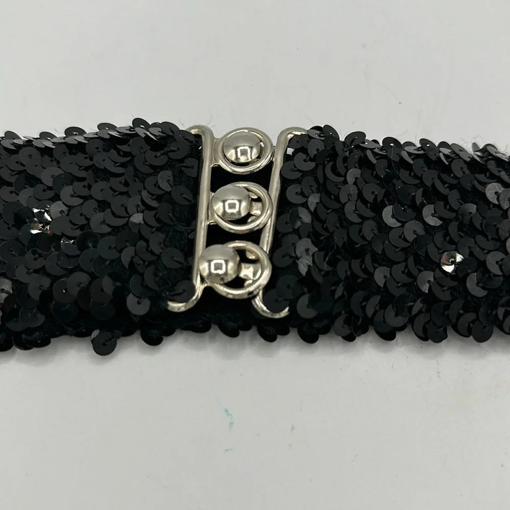 Black sequin stretch belt with silver metallic closure, size S